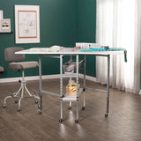 Sew Ready Mobile Folding Height Adjustable Quilting Fabric Cutting Table with Sewing Board Grid and Storage in Silver/White Top
